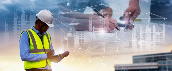 homem mexendo no ipad protegido em uma construção 