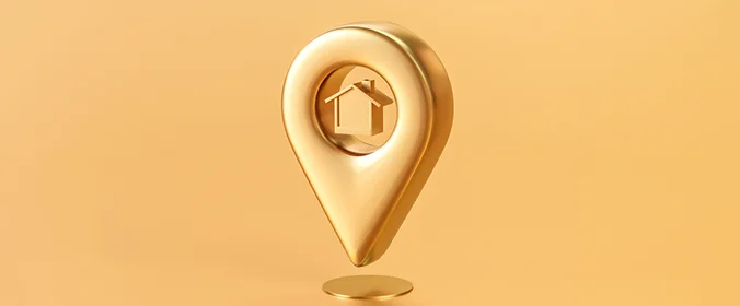 ilustração de um localizador dourado, sem cenário, com uma casinha na porção mais larga do ícone